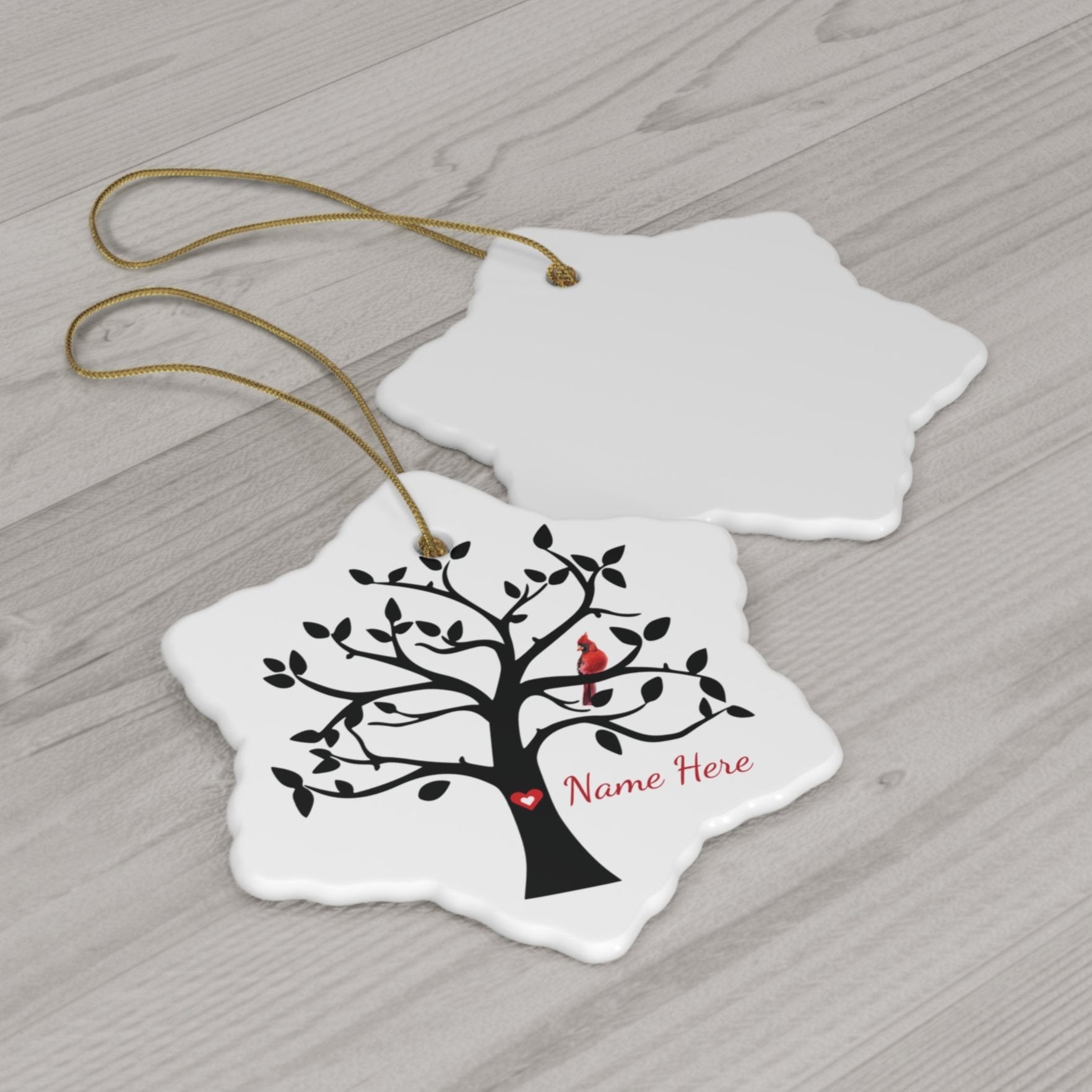 ceramic snowflake ornament with tree and cardinal