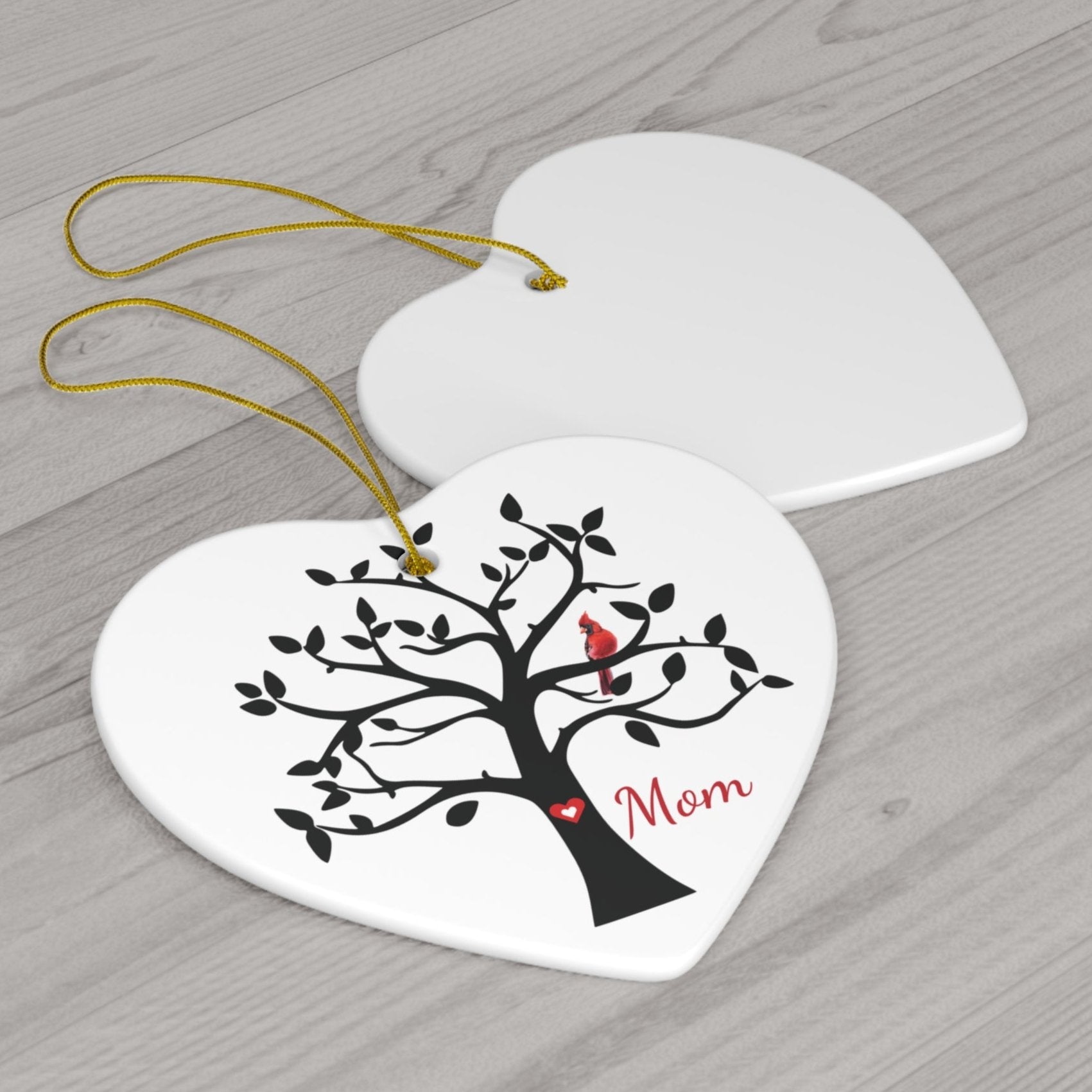 ceramic heart ornament with tree and cardinal