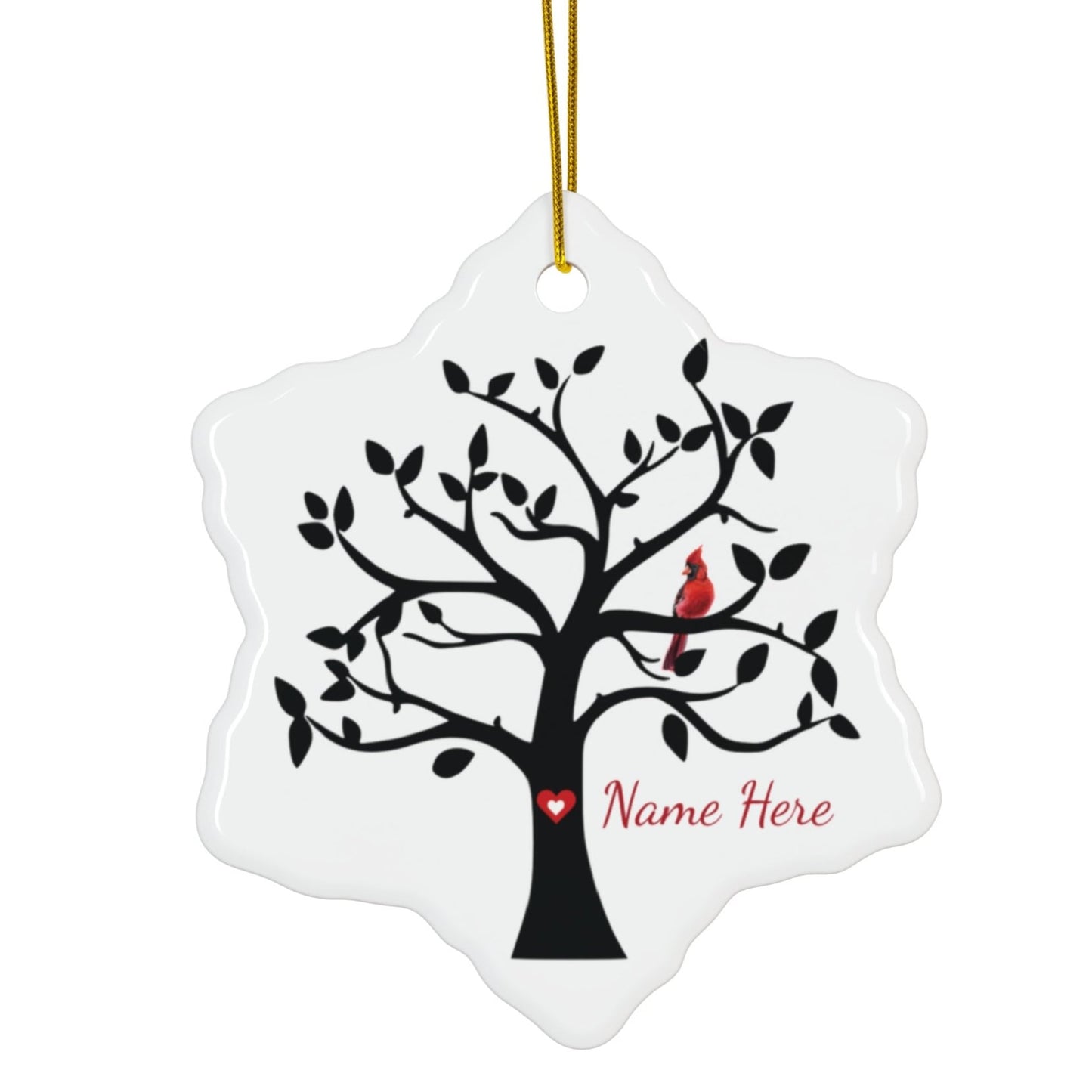 ceramic snowflake ornament with tree and cardinal