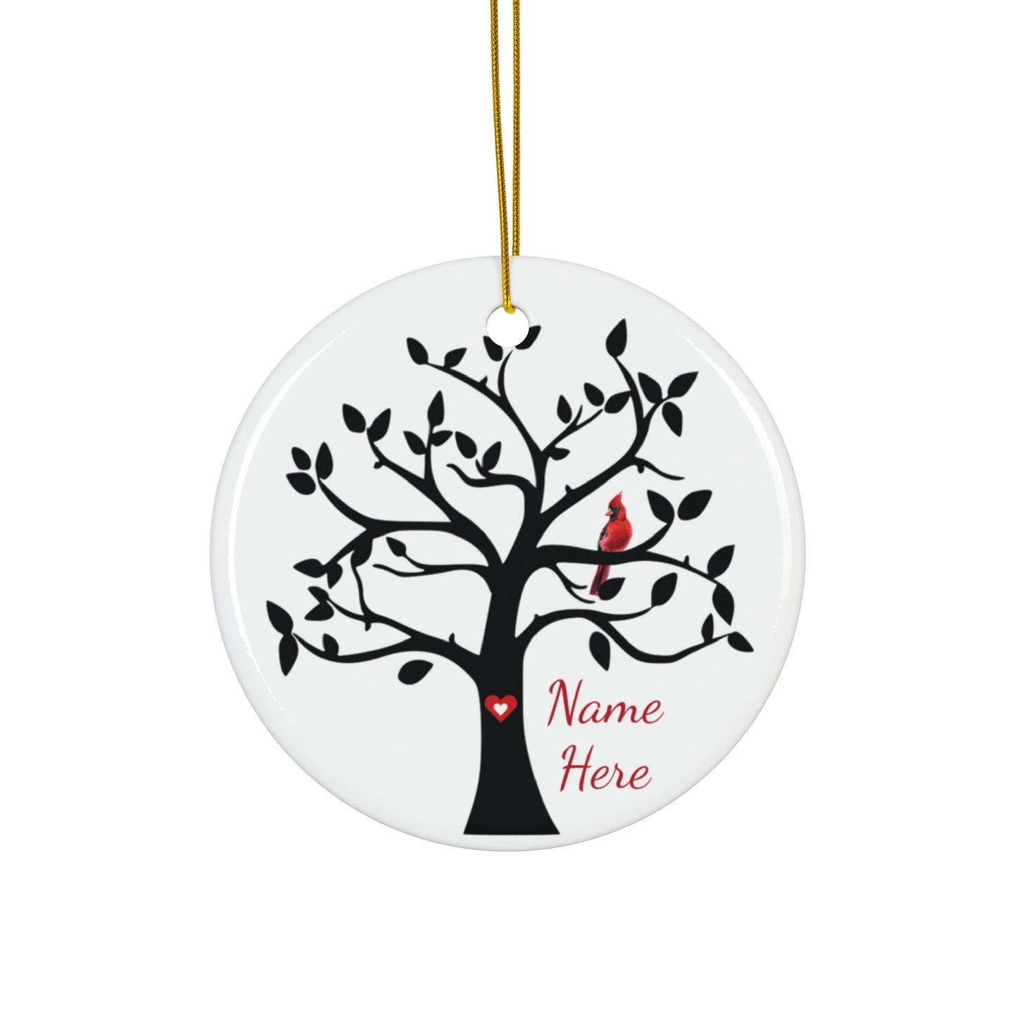 ceramic round ornament with tree and cardinal