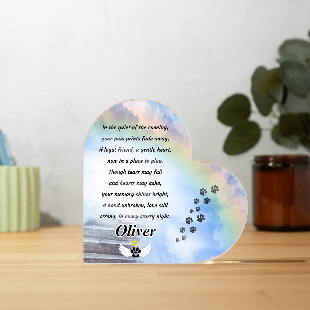 a heart shaped plaque frame with a dog's paw print rainbow bridge poem