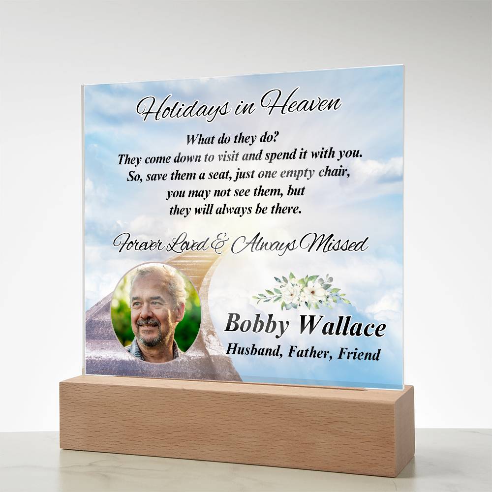 a wooden plaque with a picture of a man on it